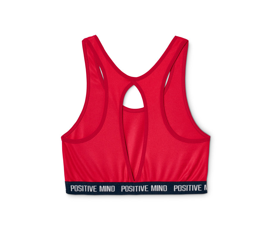 Detailaufnahme eines roten Sportbustiers aus einem 2er-Sets mit dem Schriftzug "POSITIVE MIND" am unteren Bund.