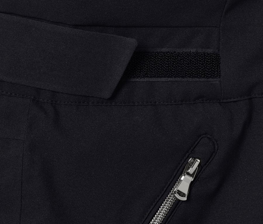 Detailaufnahme einer schwarzen High-Waist-Skihose mit silbernem Reißverschluss.