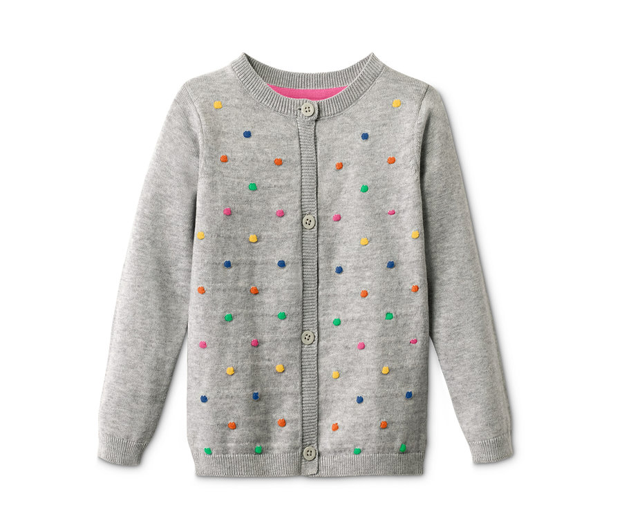 Graue Strickjacke mit bunten Punkten.