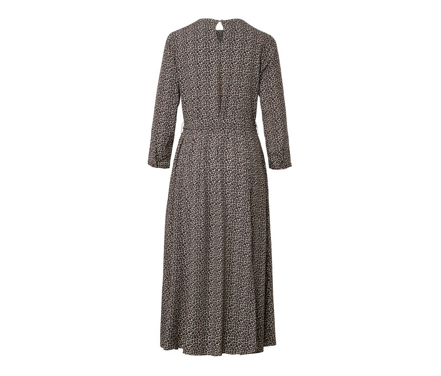 Detailansicht eines bedruckten Webkleids mit Allover-Muster.