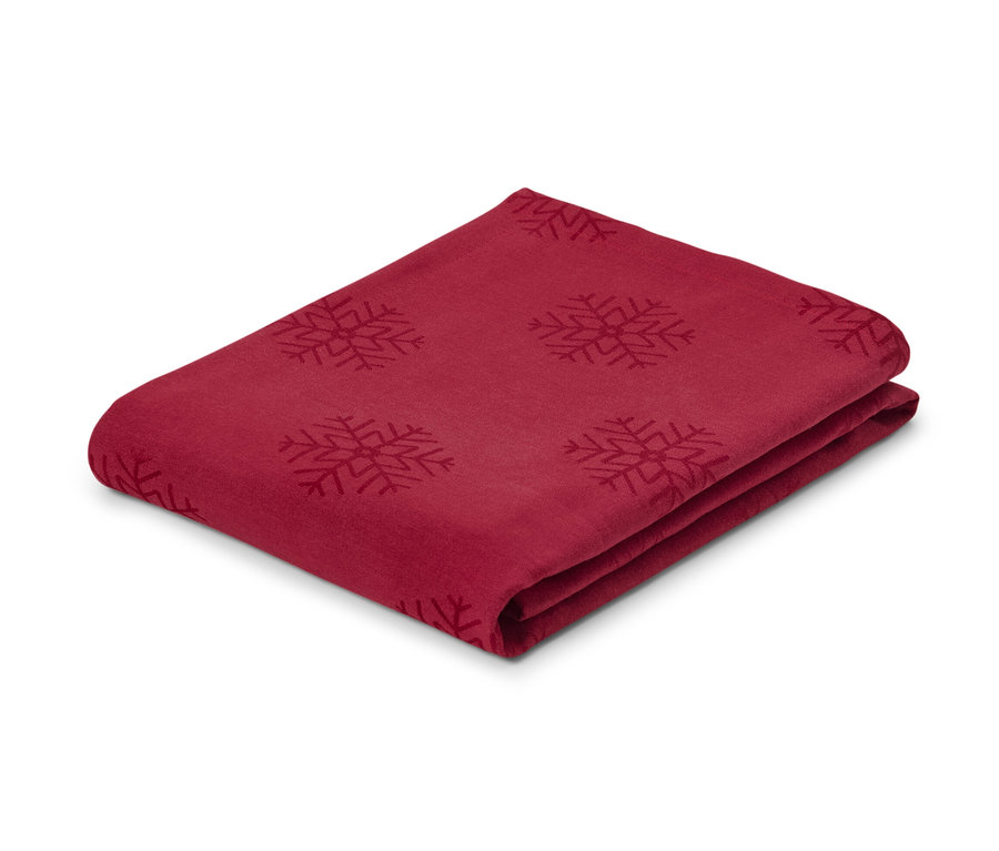 Gefaltete rote Jacquard-Tischdecke mit Schneeflockenmuster, in Normalgröße und Übergröße.