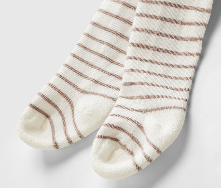 Detailaufnahme von geringelten Babystrumpfhosen (5 Paar).