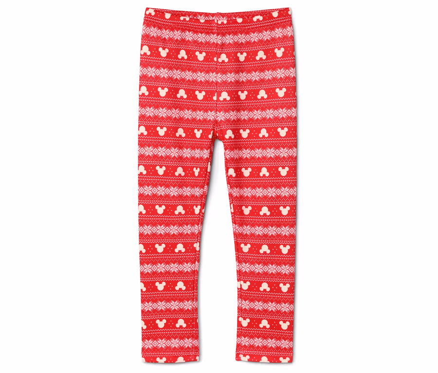 Rote Leggings mit weißem Muster aus Mickey Mouse und Schneeflocken.