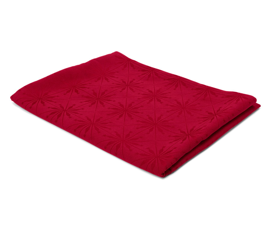 Gefalteter roter Stoff mit geometrischem Muster.