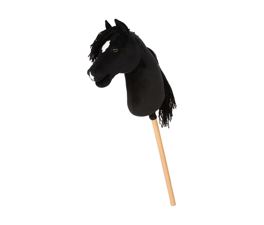 Schwarzes small foot Steckenpferd Melodie mit weißer Blesse, braunen Augen, schwarzer Mähne und Holzstab.