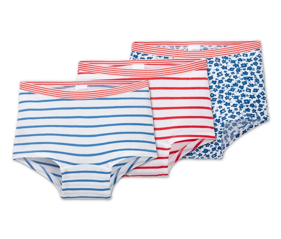 Drei Pantys: blau-weiß gestreift, rot-weiß gestreift und blau mit Blumenmuster.