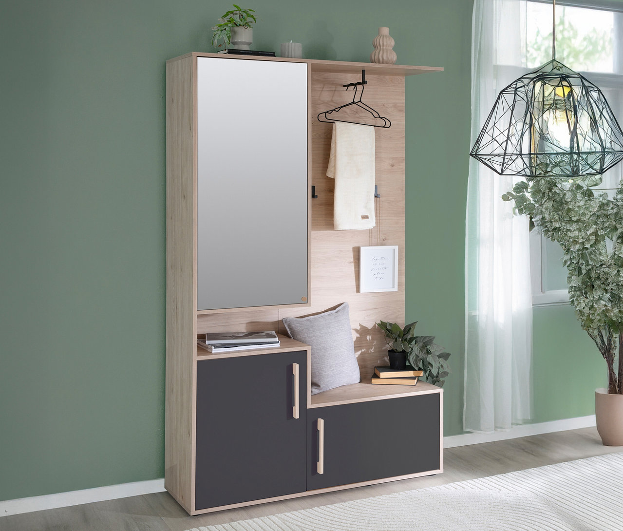 Anthrazitfarbene Roba Kompaktgarderobe »Entry« an grüner Wand mit Spiegel, Ablage und Stauraum.