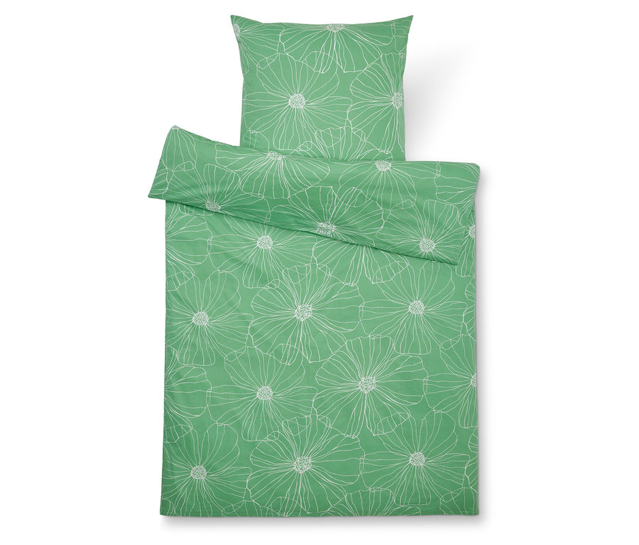 Grüne Bettwäsche mit weißem Blumenmuster, bestehend aus einem Kissenbezug und einem Bettbezug.