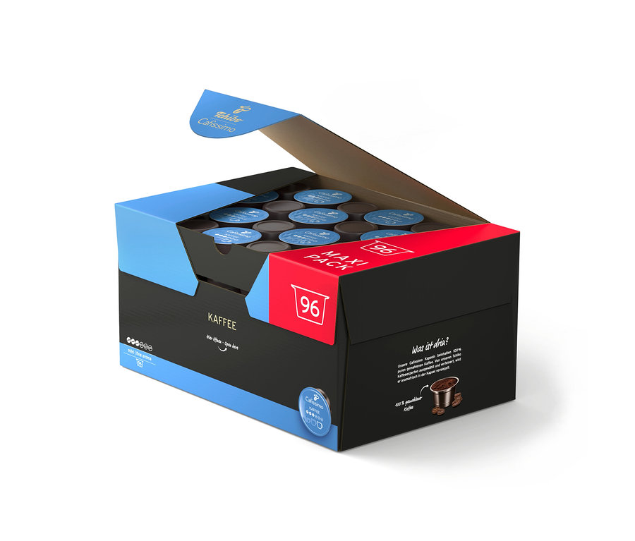 Offene schwarze Tchibo Cafissimo Maxi Pack Box mit 96 milden Kaffeekapseln in Blau und Braun.