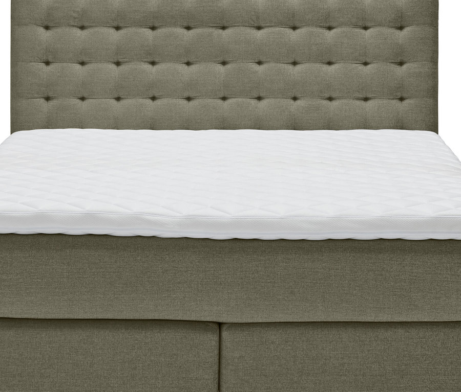 Ein hellgrünes Scapa Boxspringbett, ca. 180 x 200 cm.