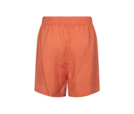 Detail einer apricotfarbenen Shorts.