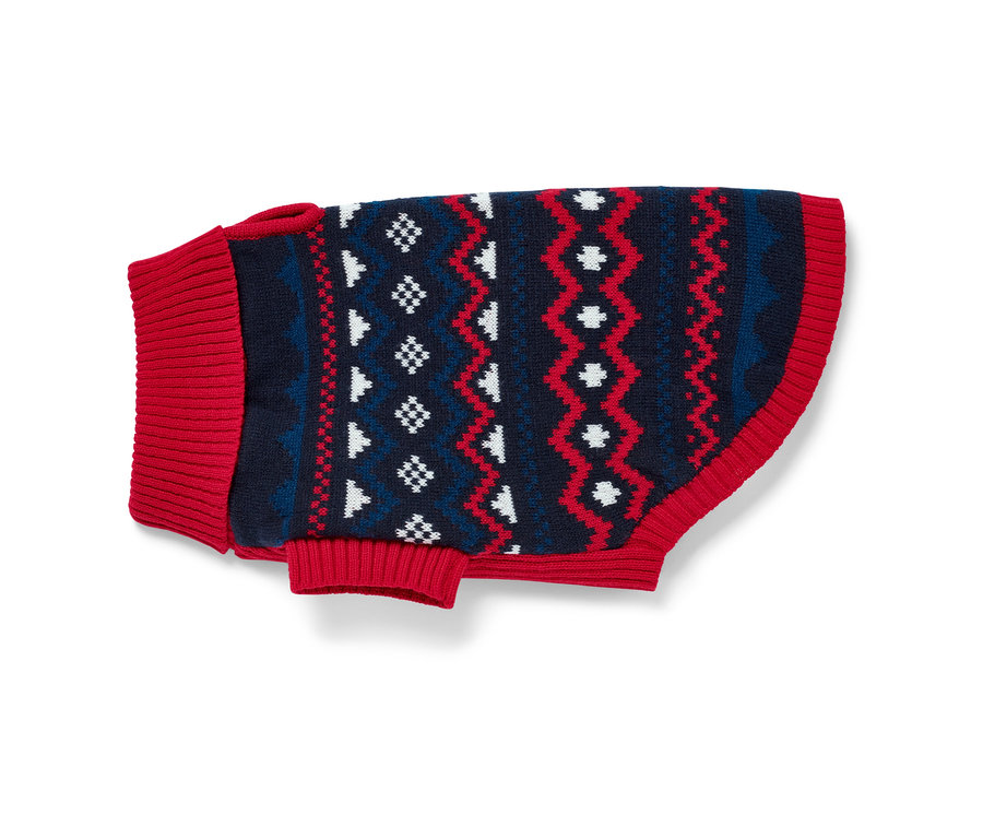 Hundepullover mit roten Bündchen und dunkelblauem Muster.