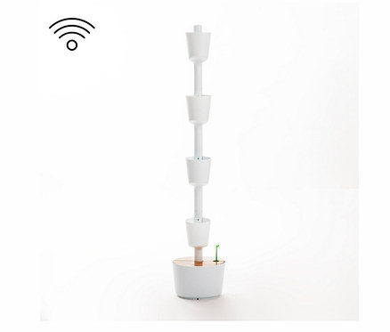 Ein weißes, selbstbewässerndes WIFI-Pflanzenregal mit vier Töpfen und einer kleinen Pflanze.