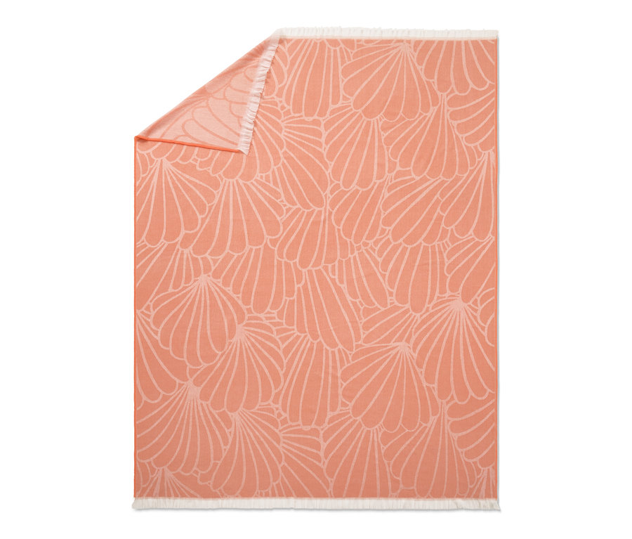 Orangefarbene Wende-Wohndecke mit Fransen und Blumenmuster.
