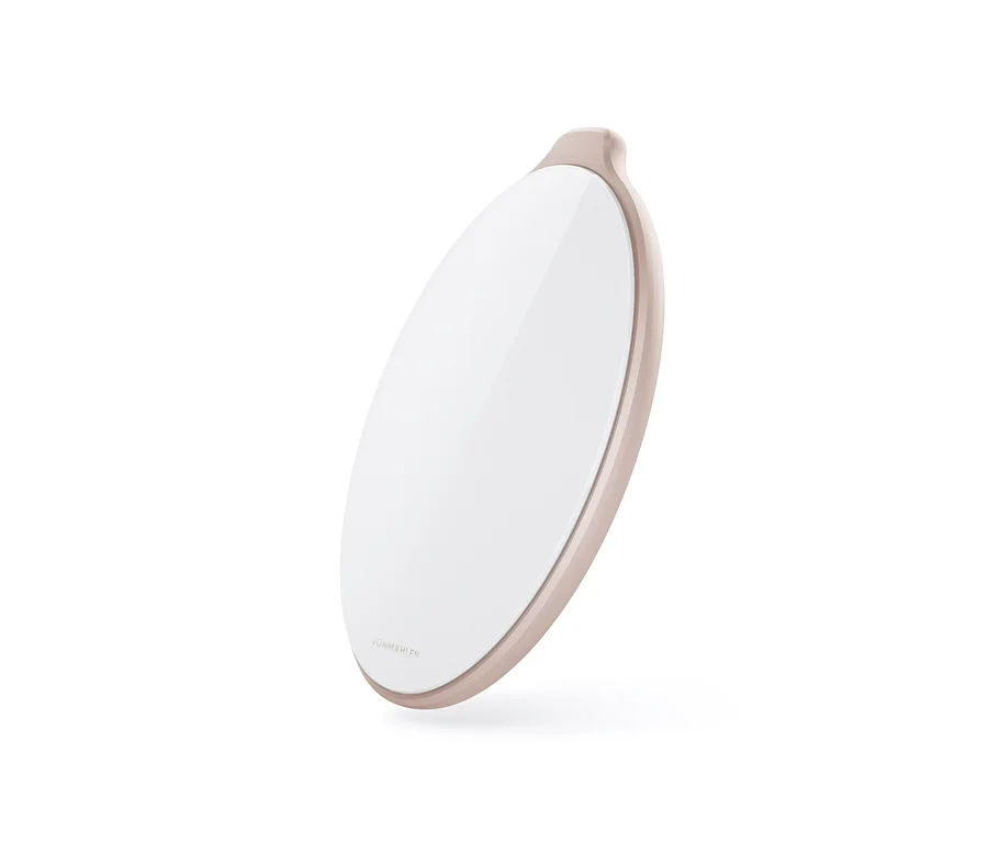 Ein beiger Vonmählen »Aura®« Wireless-Charger in ovaler Form.