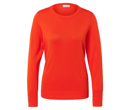 Orangefarbener Strickpullover mit langen Ärmeln und Knöpfen an den Manschetten.