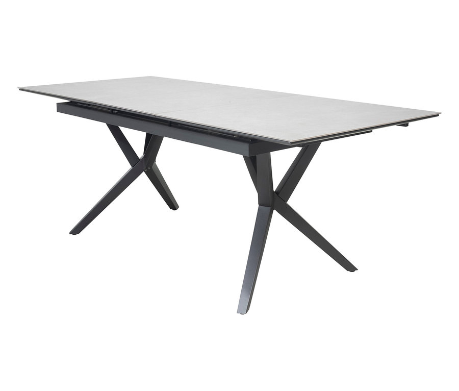 Esstisch mit grauer Tischplatte und schwarzem X-förmigem Gestell.