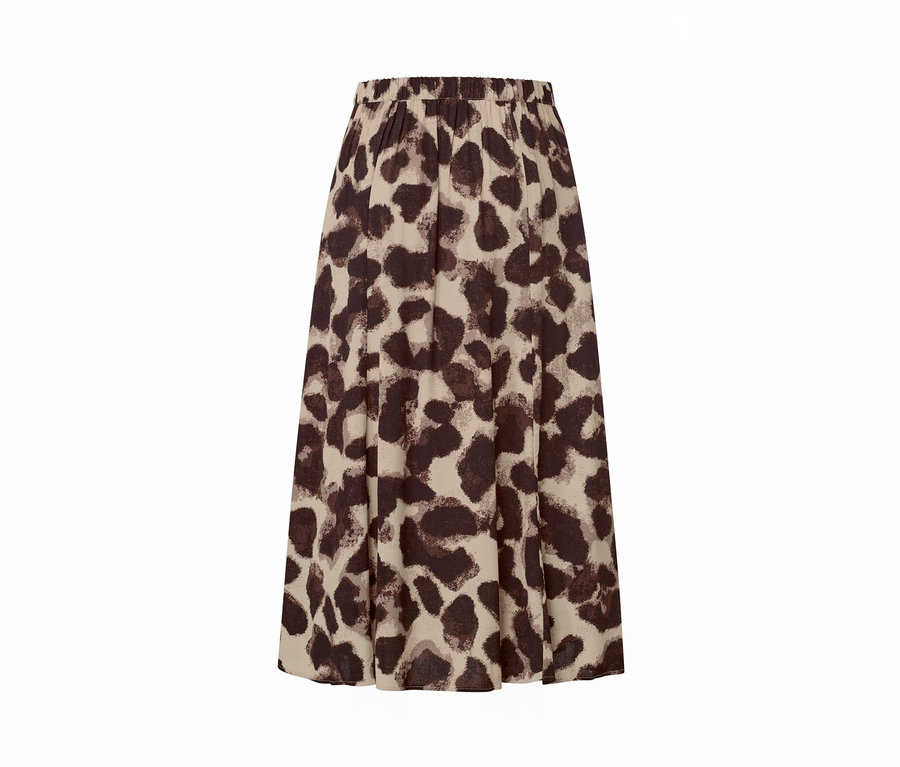 Ein bedruckter Midi-Rock mit braunem Tiermuster auf beigem Grund.