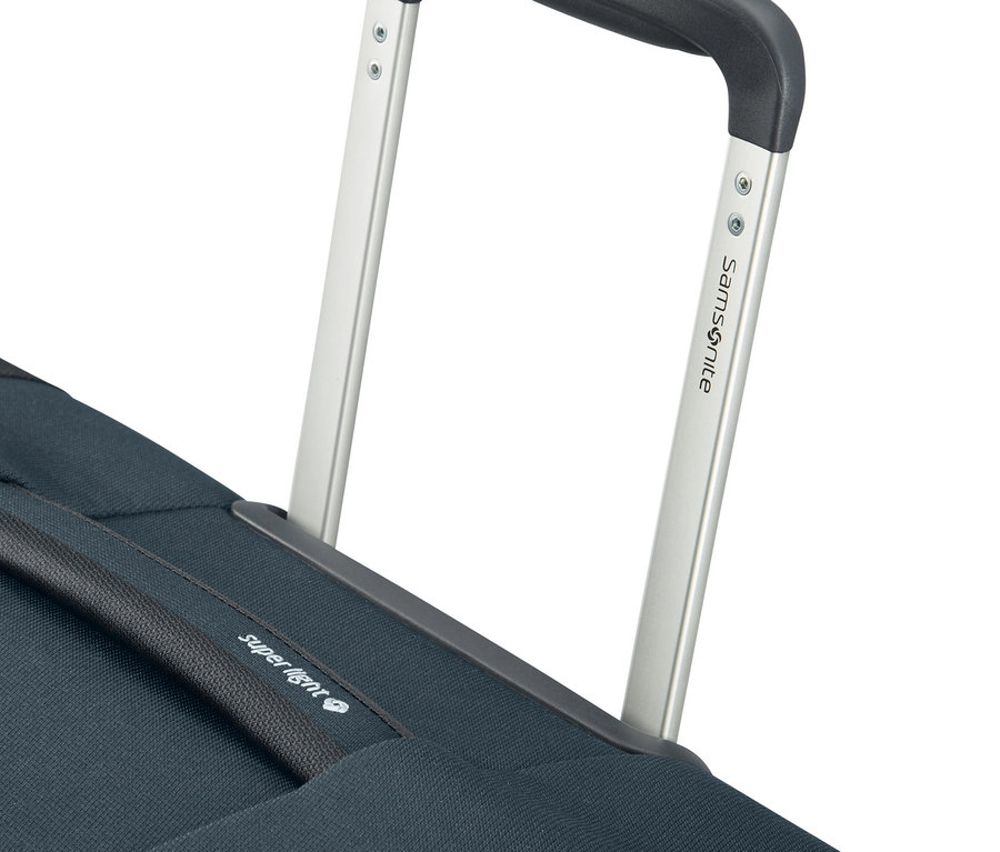 Detailansicht eines marineblauen Samsonite CITYBEAT SPINNER Koffers mit ausgezogenem silbernen Griff.