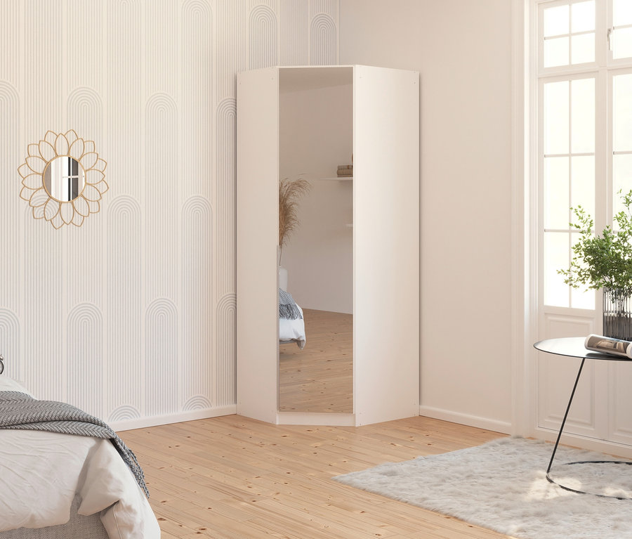 Schlafzimmer mit Eckschrank »Memphis« mit Spiegeln, Bett und rundem Spiegel.