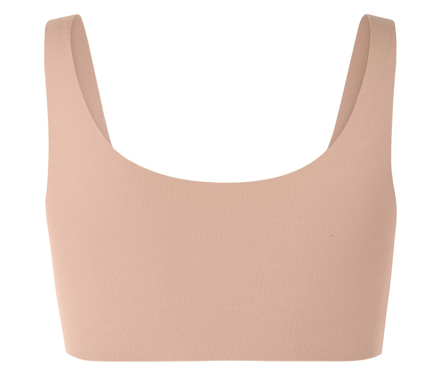 Pfirsichfarbenes Sportoberteil mit breiten Trägern.
