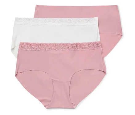 Drei Slips mit Spitzenbesatz in Rosa und Weiß liegen übereinander.