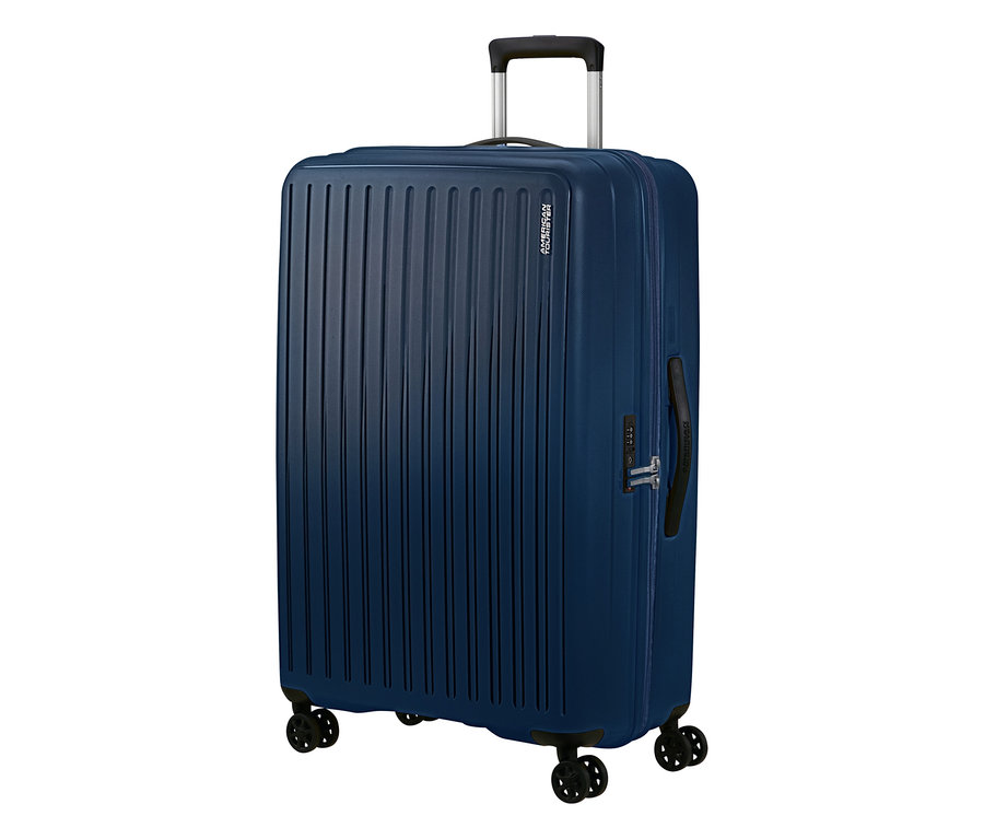 Großer, marineblauer American Tourister Rejoy Spinner Koffer mit Rollen, ausziehbarem Griff und gerillter Oberfläche.