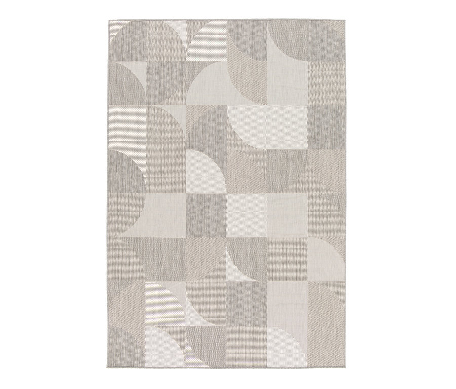 Ein faltbarer Outdoor-Teppich in Beige mit geometrischem Design.