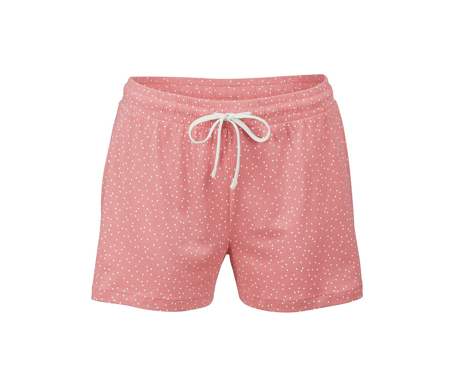 Rosa Shorts mit weißen Punkten.