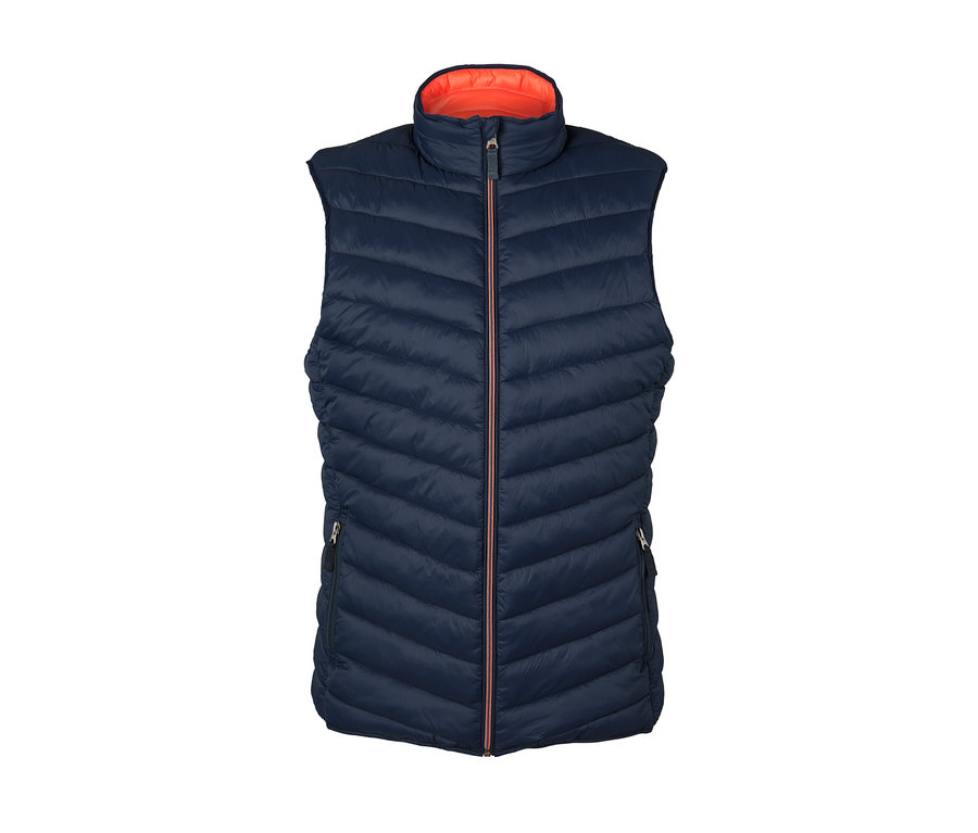 Marineblaue Wende-Steppweste mit orangefarbener Innenseite.