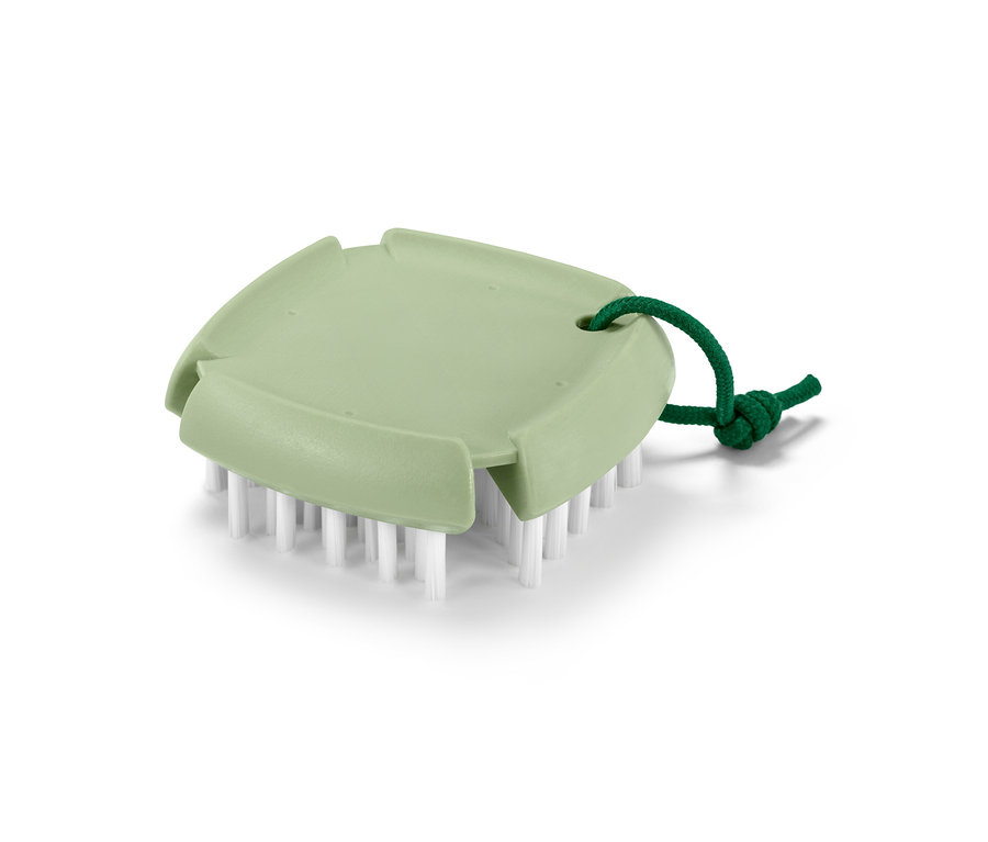 Eine flexible Gemüse- und Obstbürste in Grün mit weißen Borsten.