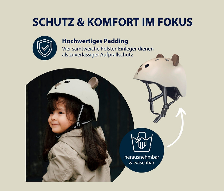 Mädchen mit braunen Haaren trägt HUDORA Kinderhelm, Beary, 48–52 cm.