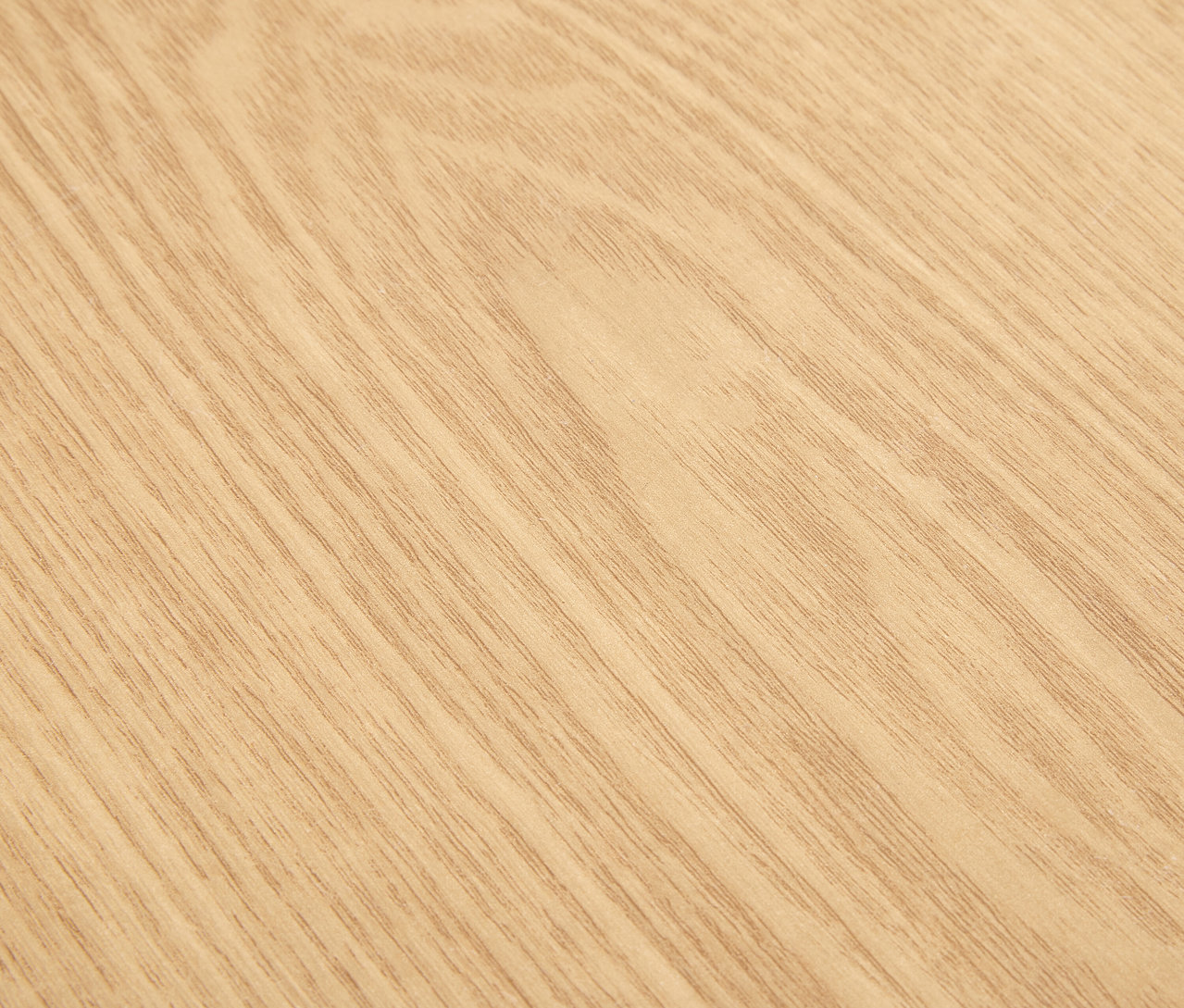 Detailaufnahme einer hellen Holzstruktur.