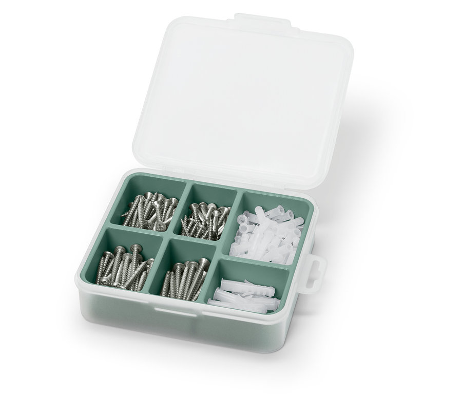 Offenes Schrauben-und-Dübel-Set in einem weiß-grünen Gehäuse.
