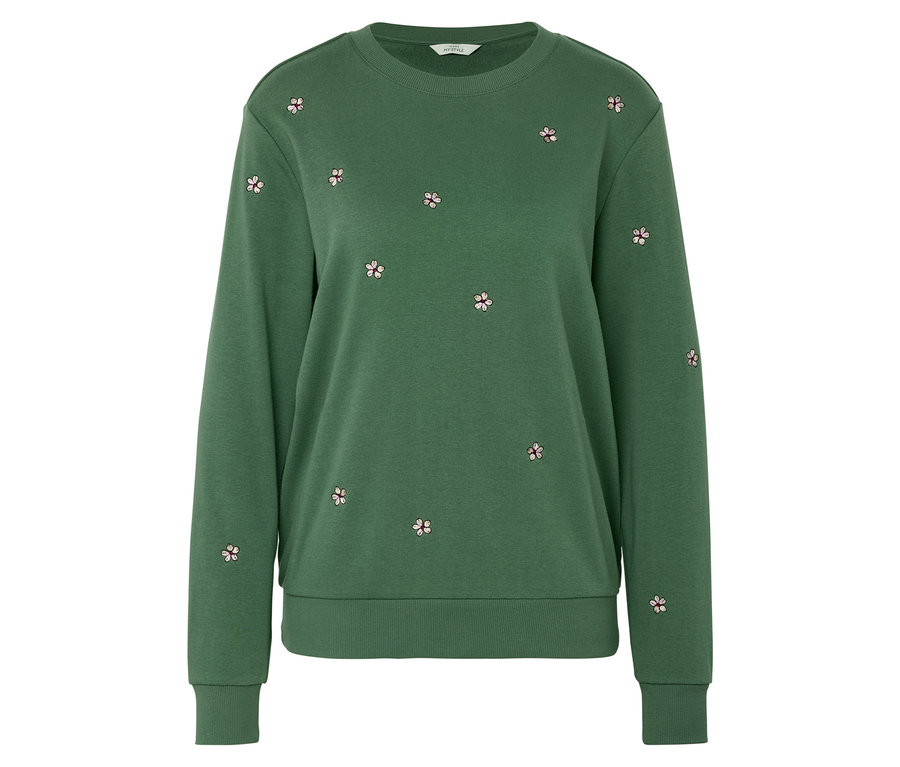 Ein grünes Sweatshirt mit kleinen Blumenstickereien.