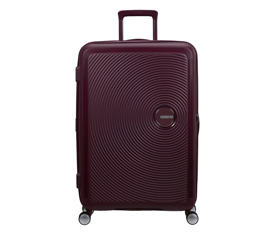 Großer American Tourister Hartschalen-Koffer Soundbox Spinner in Wildkirsche mit konzentrischen Kreisen und vier Rollen.