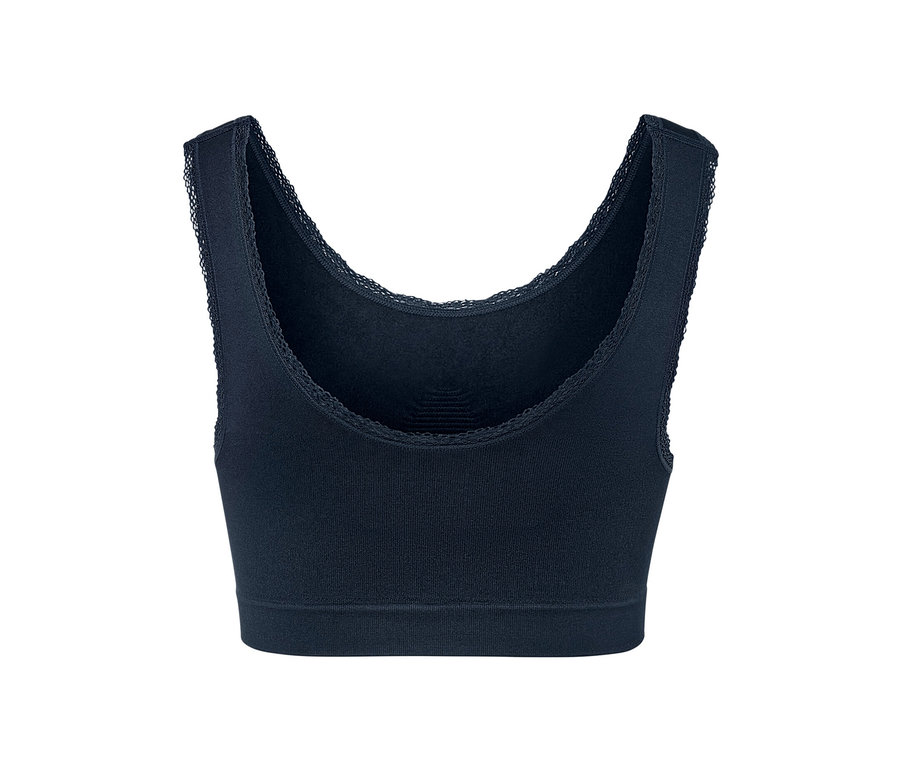 Detailansicht eines dunkelblauen Seamless-Bustiers mit Spitzenbesatz.