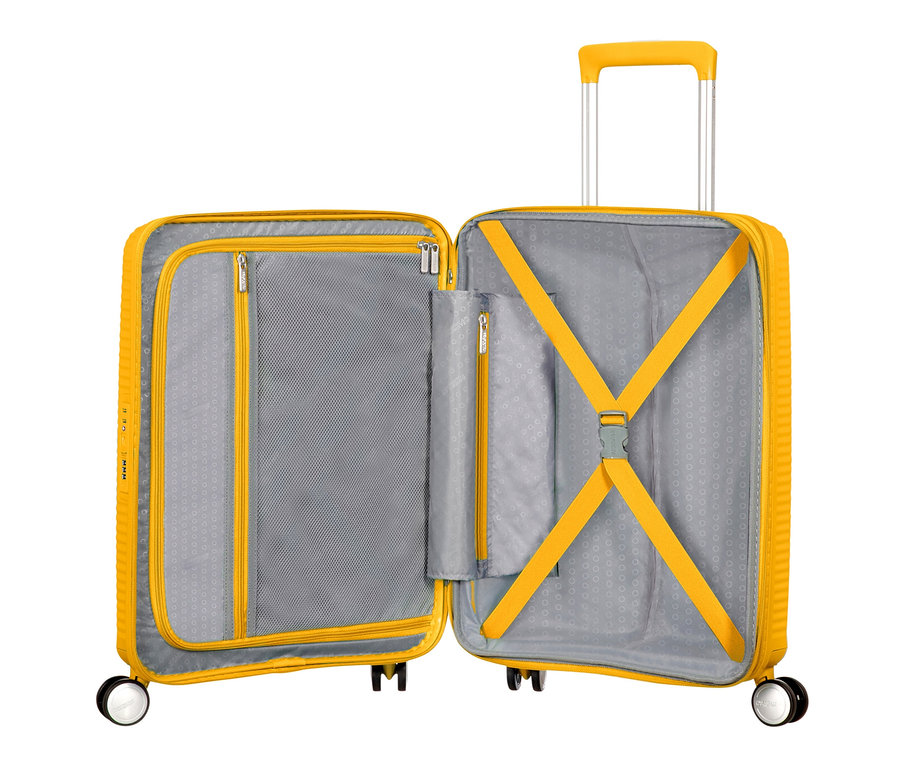 Geöffneter goldgelber American Tourister Hartschalen-Koffer »Soundbox« Spinner, klein.