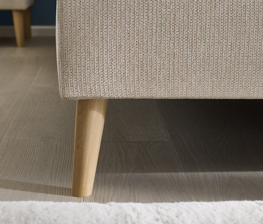 Detailansicht eines beigen DOMO collection Boxspringbetts mit Rückenfunktion und Topper.