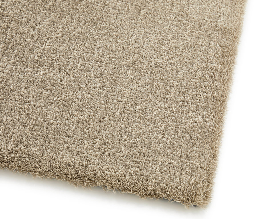 Nahaufnahme eines beigen Teppichs "Mellow".