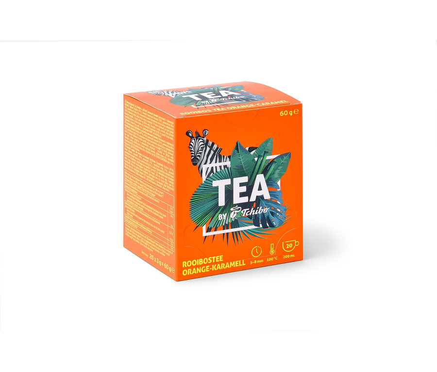 Ein orangefarbener Karton TEA by Tchibo Rooibos Orange-Karamell - 8x 20 Teebeutel.