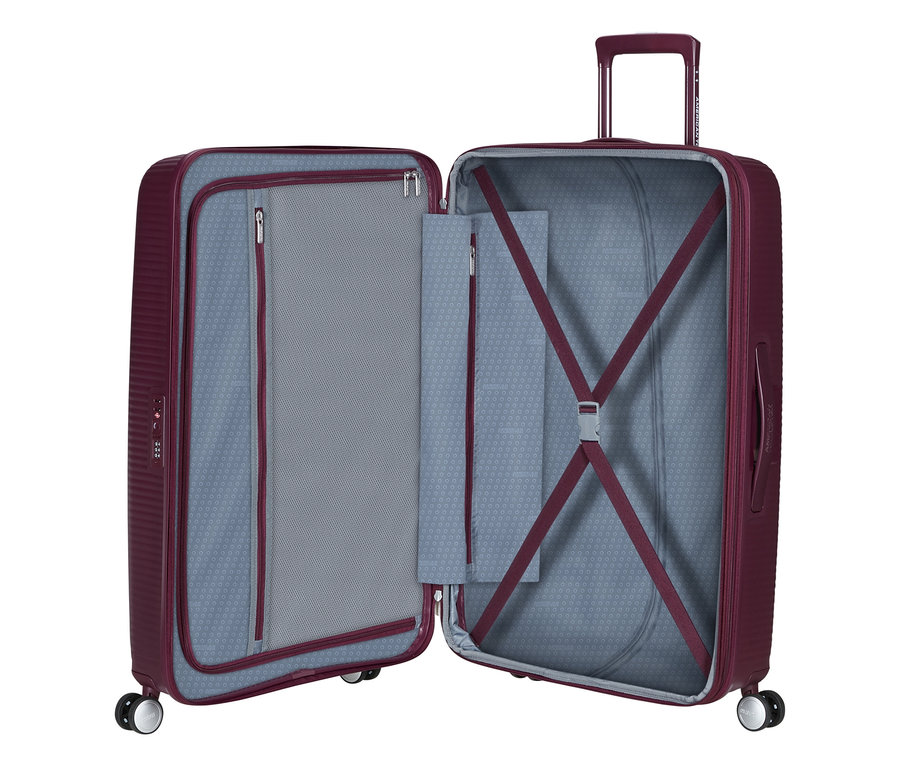 Offener American Tourister Hartschalen-Koffer Soundbox Spinner in Wild Cherry, groß, mit Netzfach und Packgurten.