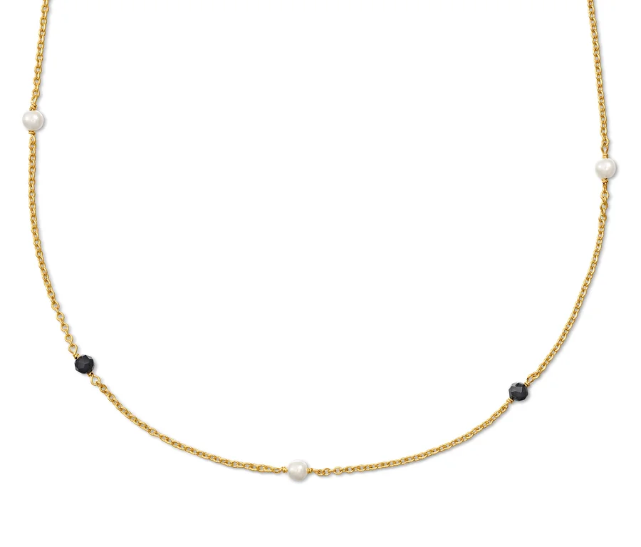 Goldene Kette Black and White mit Perlen und schwarzen Kügelchen.