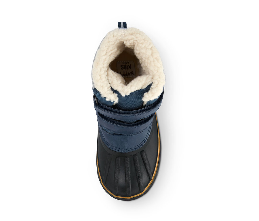 Draufsicht auf einen Allwetterstiefel mit blauem Stoff, schwarzem Gummiboden und cremefarbenem Fell.