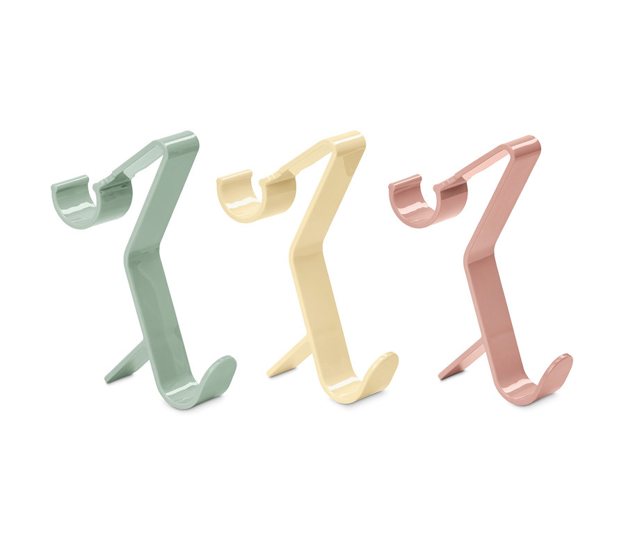 Drei Clip-Haken in Grün, Creme und Pink.