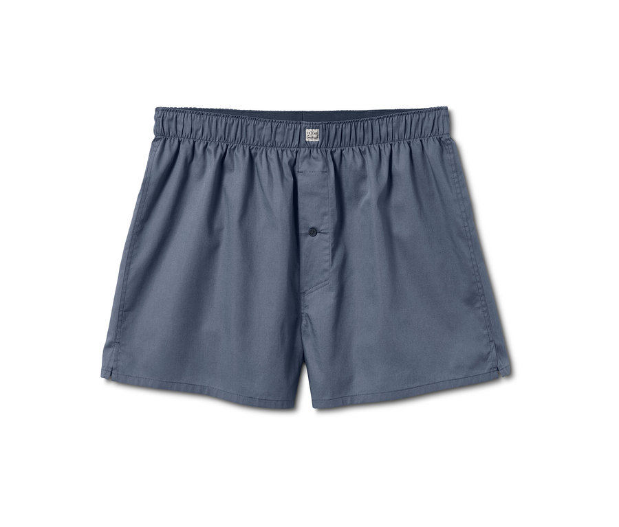 Eine blaue 2er Packung Webboxershorts mit Alloverprint.
