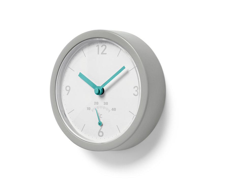 Eine graue Funk-Badwanduhr mit Thermometer zeigt 11:29.