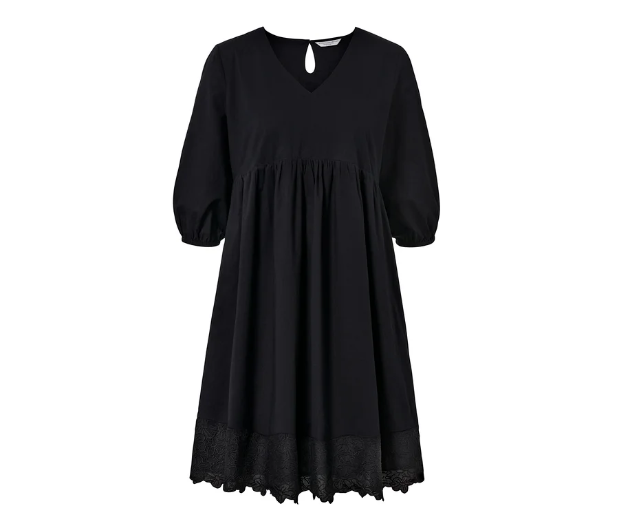 Schwarzes Webkleid mit Stickerei.