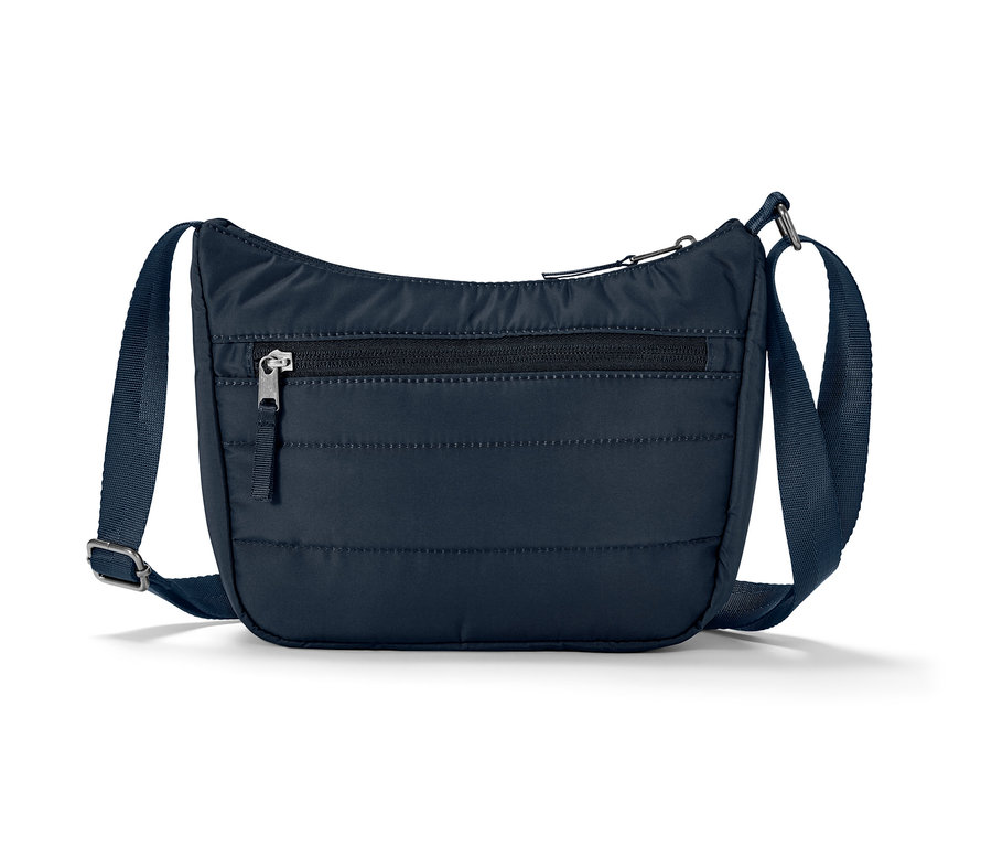 Eine blaue Umhängetasche liegt auf einem weißen Hintergrund.