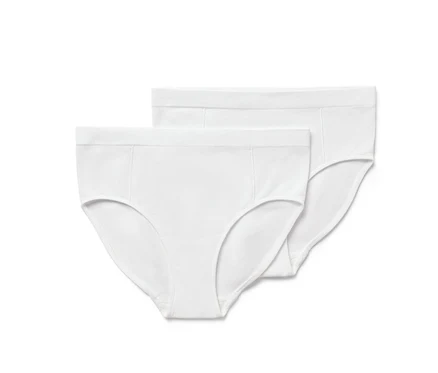 Zwei weiße Seamless-Pantys mit Rippstruktur.